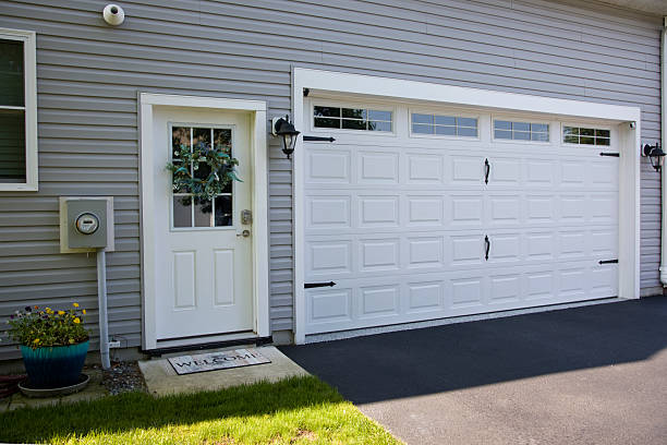 24/7 Emergency Garage Door Panel Replacement experts in Tiffin, IA